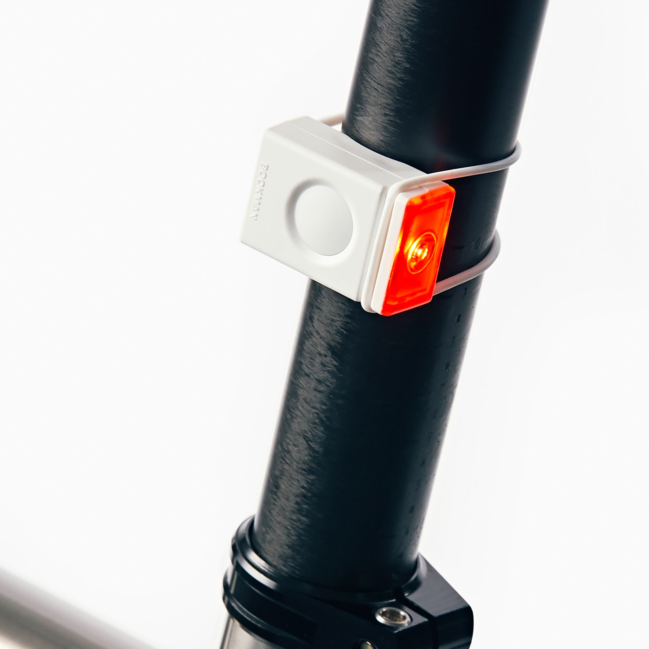 Block Light rear tail light mounted on bike frame